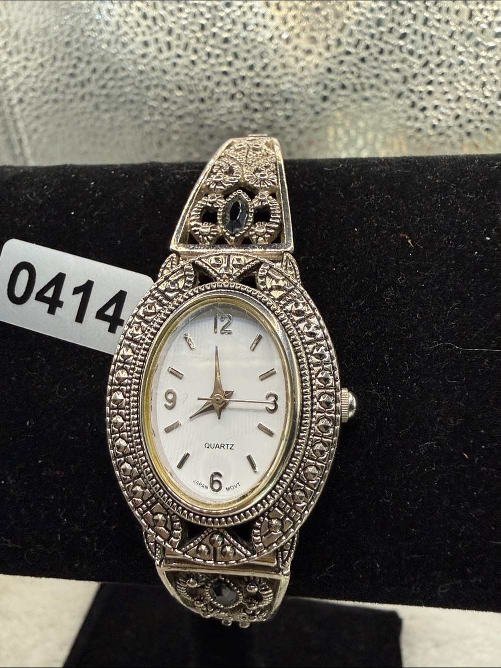 Avon Silver-toned Filigree Oval Watch with White Dial